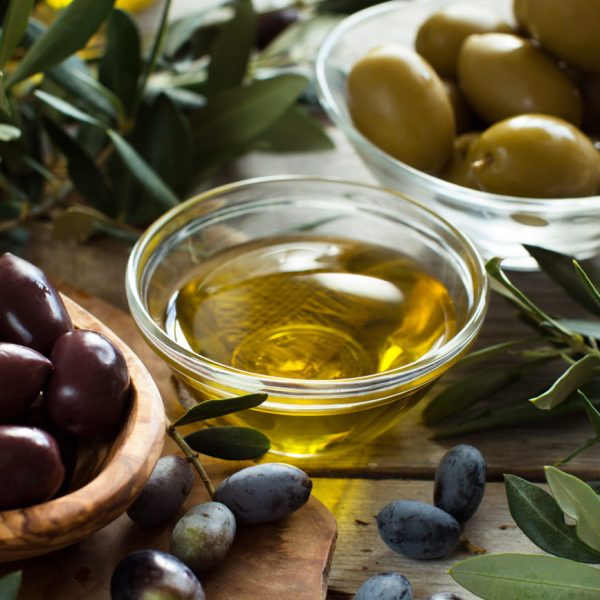 olive-oil-and-olives-on-wood-background-2021-08-26-15-46-40-utc (1)